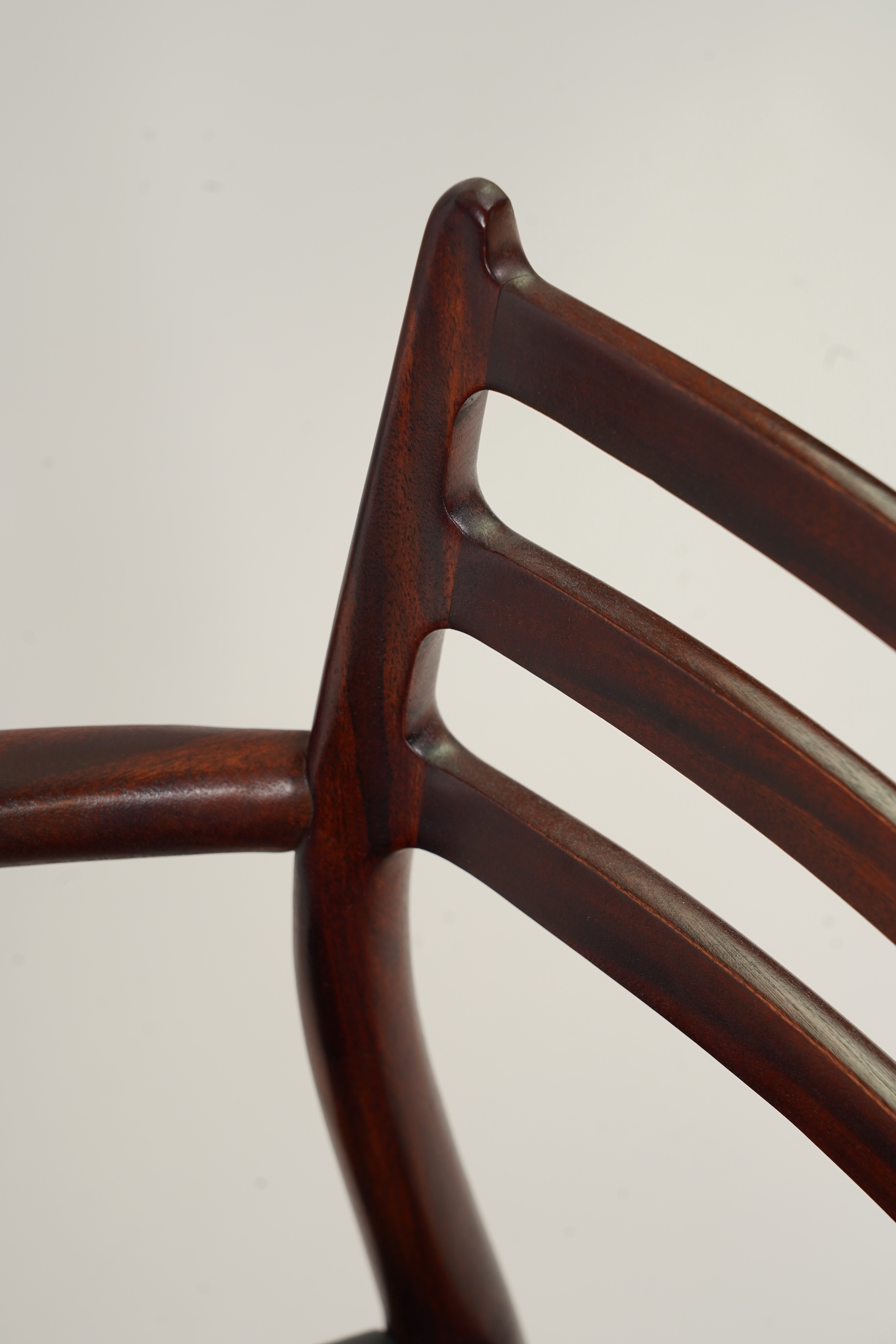 Niels Otto Møller (Danish, 1920-1982) for JL Møllers Møbelfabrik: A pair of 'Model 62' carver chairs